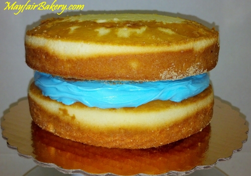 gender reveal cake filled blue