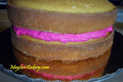 gender reveal cake filled pink